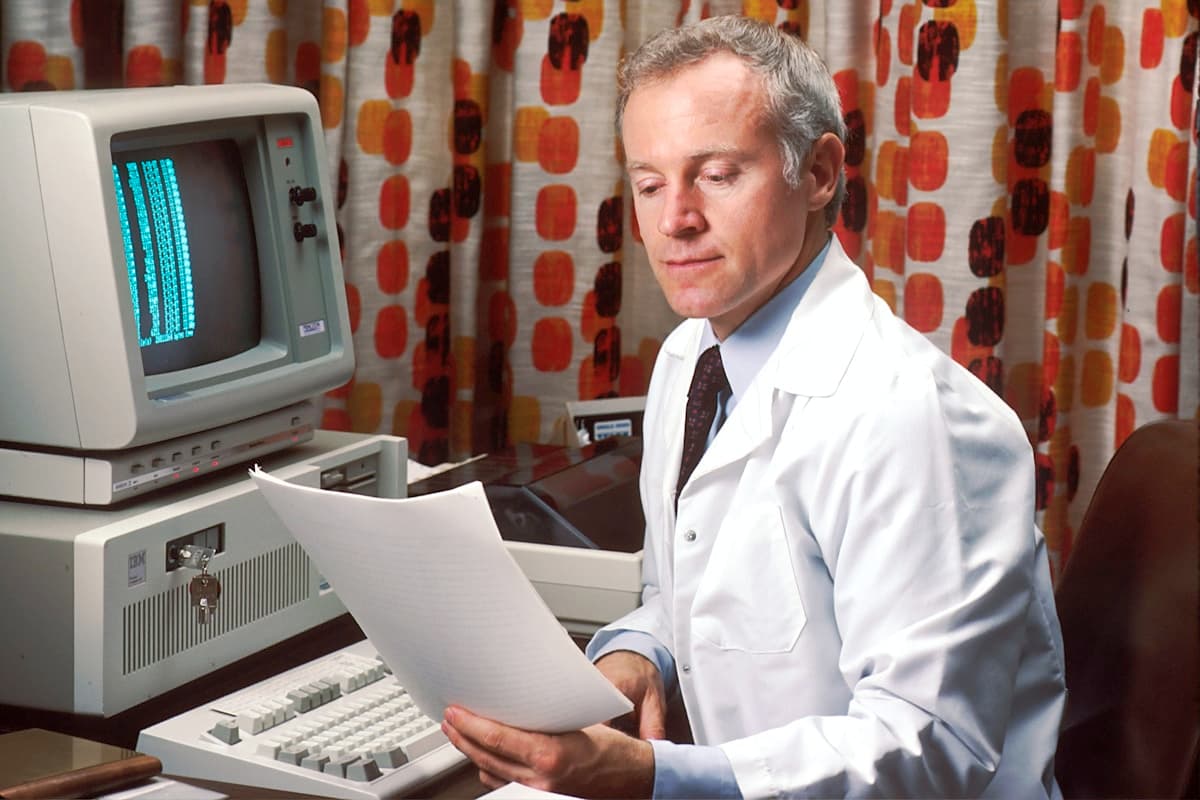 Doctor showing patient health information on a tablet